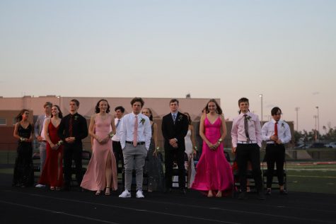 The homecoming court stand to recognized during Thursdays celebrations.