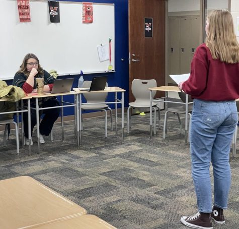 Freshman Addy Happ practices her original oratory while waiting for
feedback from speech coach Tia Stubbs. “I already wrote a similar
speech in 8th grade and I wanted to work off of that, said Happ.