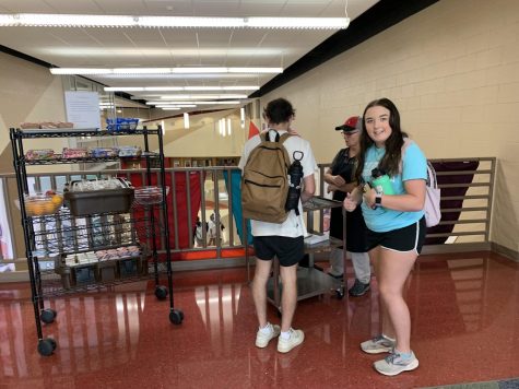 Students purchase breakfast items to take to their second period class. 