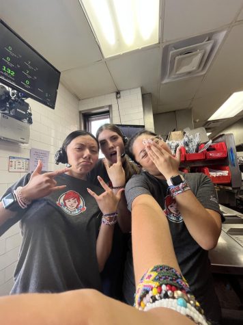 A picture taken with some co- workers during some down time at Wendys. 