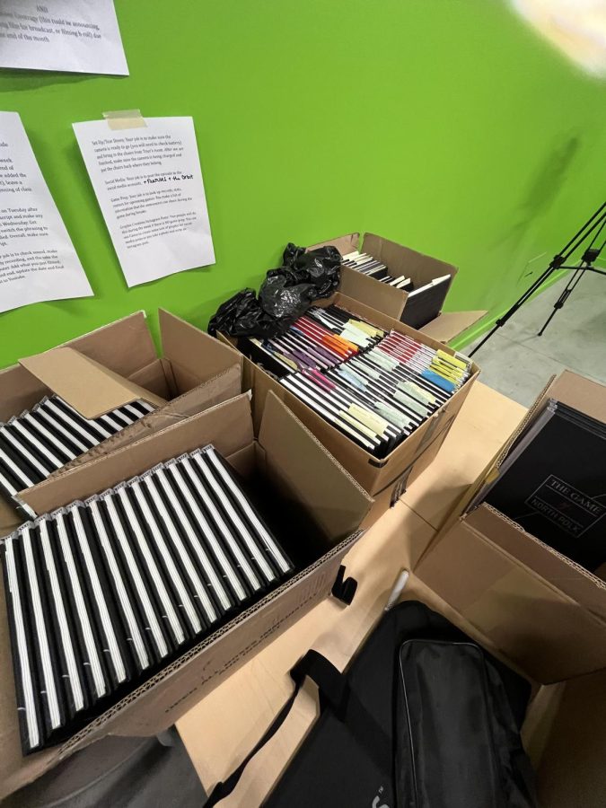 Boxes on boxes of yearbooks ready for pick-up that can be found in the green-screen room next to Mrs. Triers’s room.