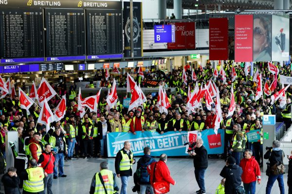 Transportation workers at an airport during strike. Picture from Reuters.