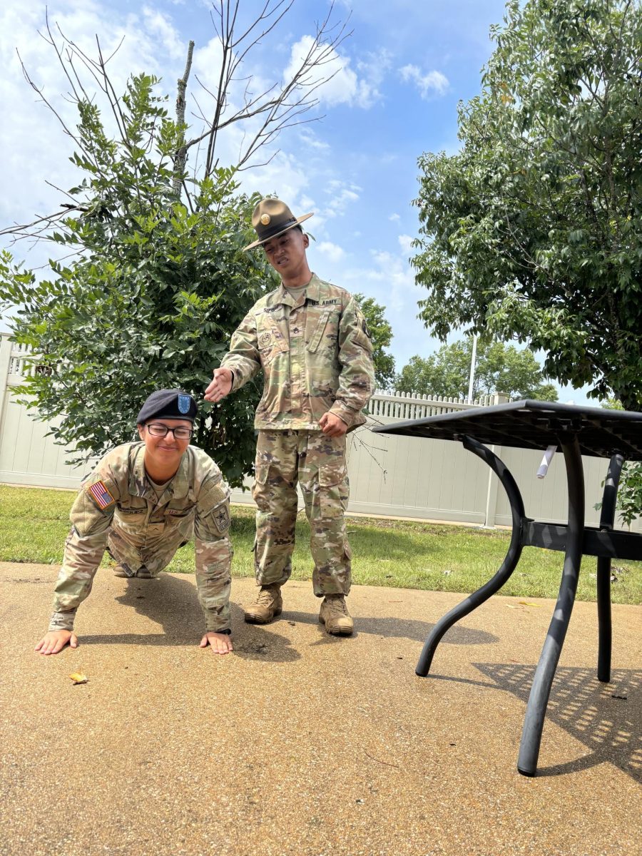 Picture on family day with Senior Drill Sergeant Sipin; we were his last cycle of trainees as a drill sergeant.