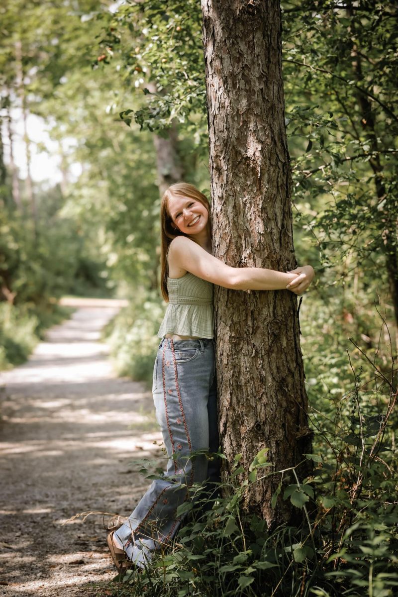 Photo of the author showing her love for the environment.
