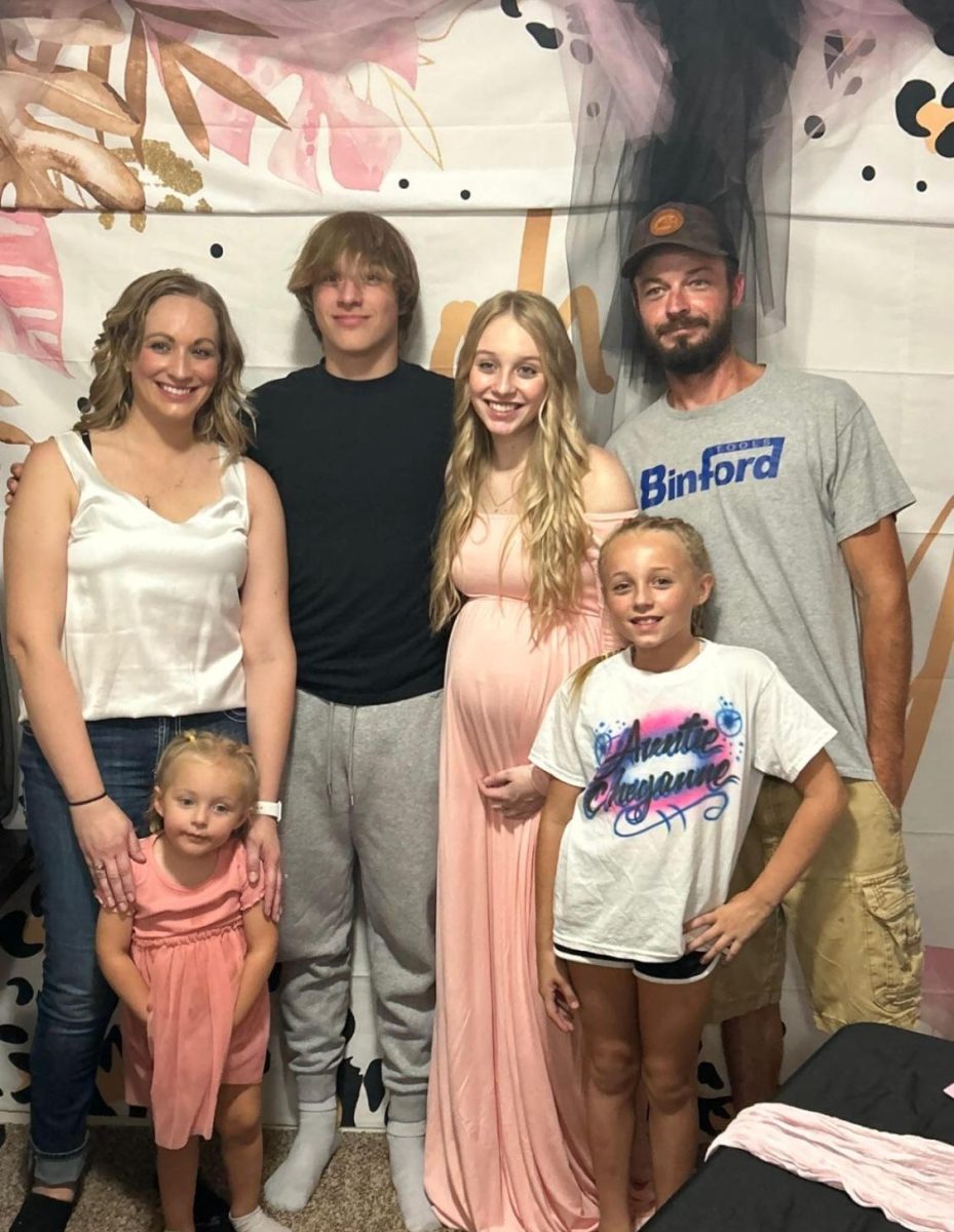 Mitchell and her family on her baby shower.